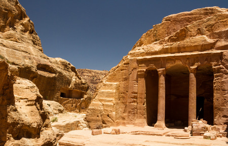 An ancient building carved into the mountain in the Nabatean city of Petra, Jordan.の写真素材