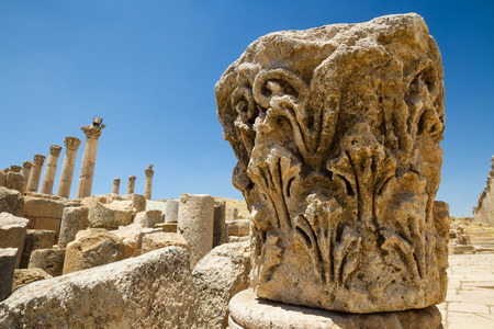 Detail of a capital with the main road (Cardo maximus) in the background.の写真素材