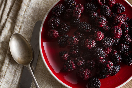Fruits of the forest:  blackberries. Healthy breakfast food.の写真素材