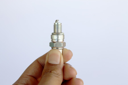 New spark plug in hand before use.の写真素材