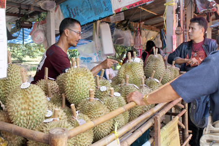Khunhan,Si sa ket,THAILAND - JUNE 30,2018 : Thai Tourists are buying Durians fruit at the fruit market.のeditorial素材