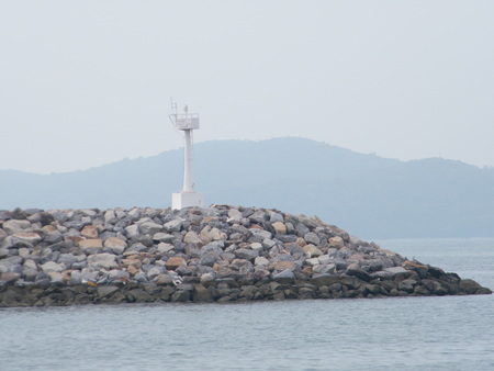Landscape of a lighthouse and the ocean and sky.Sea picture.の写真素材