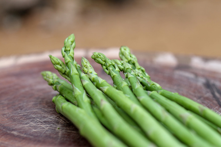 Raw asparagus. Fresh Asparagus on wooden backgroundの写真素材