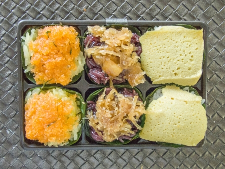 the delicious Thai sweets , the sticky rice with various types of toppings の写真素材