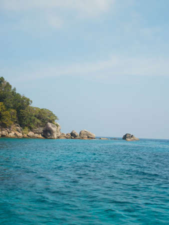 The scenic view of sea and small cape.の写真素材