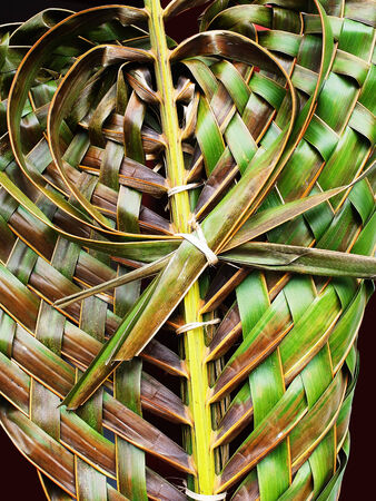 Coconut leaves are weaved together to be three layer of  heart shaped pattern .の写真素材
