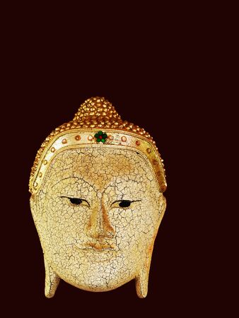 A golden facial  mask of a sacred god.の写真素材