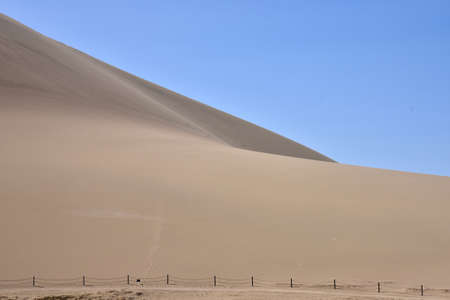 Echoing - Sand Mountain or Mingsha Shan in Chinese is located in Dunhuang county , Gansu Province ,...