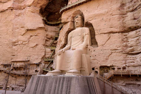The Great Maitreya Buddha in Bingling grottoe with 27 meters high , in Lanzhou , Gansu , China.