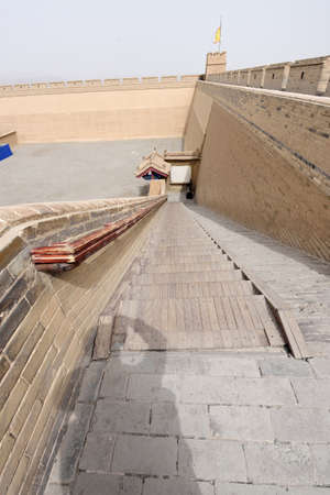 A staircase that leads to the guard tower of Jiayuguan Forte , Gansu Province , China.のeditorial素材