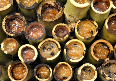 glutinous rice roasted in bamboo jointsの写真素材