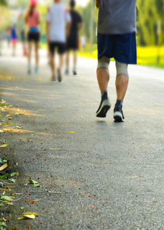 Exercise to lose weight in park public in bangkok and blur backgroundの写真素材