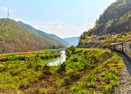 beautiful mountain and landscape viwe by railway travelの写真素材