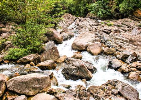 stone rock and waterfall beauty nature in south Thailandの写真素材