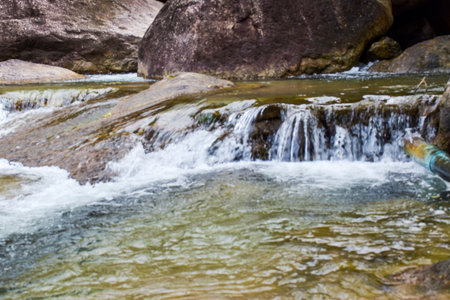 waterfall beauty nature and rock stone in south Thailandの写真素材