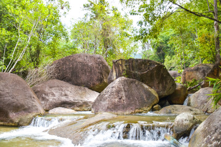 waterfall beauty nature and rock stone in south Thailandの写真素材