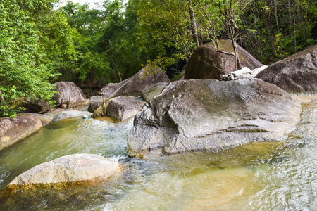 waterfall beauty nature and stone rock brown in south Thailandの写真素材