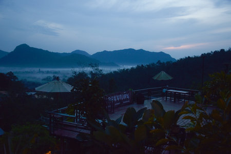 Early morning mist and beautiful mountain in south Thailandの写真素材