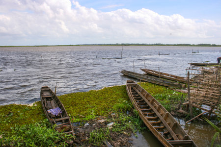 old wooden boat fisherman in lake south Thailandの写真素材