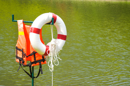 Life jackets and floats save life by the water and the sceneryの写真素材