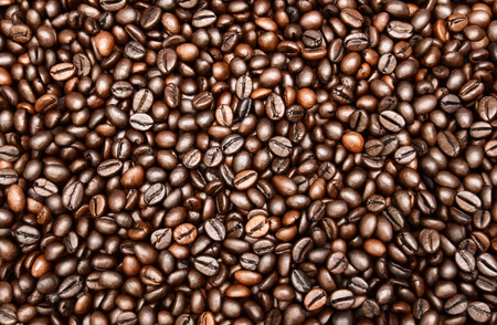 Close up photo of roasted coffee beans. Roasted coffee beans texture,  background and wallpaper.の写真素材