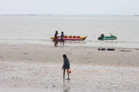 White beach and boat and three のeditorial素材