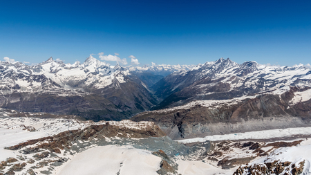 Snow Mountain Range Landscape with Blue Sky at Alps Region, Zermatt, Switzerland の写真素材