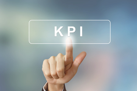 hand pushing KPI or Key Performance Indicator buttonの写真素材