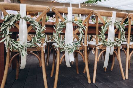Boho wedding chair with eco decor for guests.