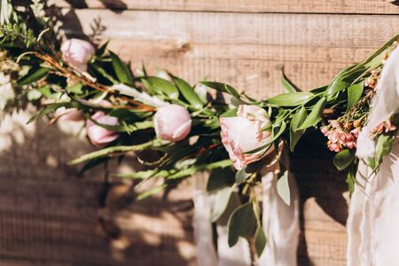 Wedding asymmetrical stylish bouquet with purple rosesの写真素材