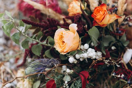 Wedding floristry in a yellow autumn meadow.の写真素材