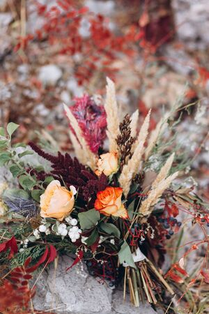 Wedding floristry in a yellow autumn meadow.の写真素材