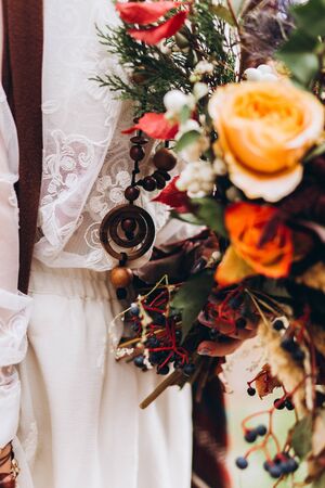 Wedding floristry in a yellow autumn meadow.の写真素材