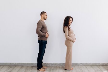 Young parents expecting a baby. Healthy family.の写真素材