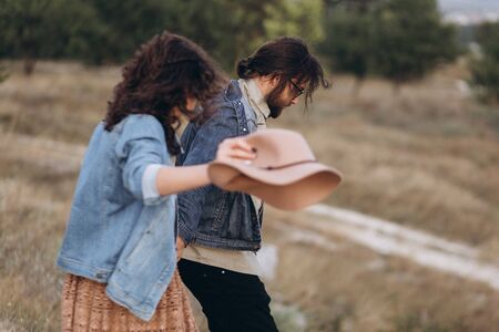 Boyfriend and Girlfriend hug each other in nature.の写真素材