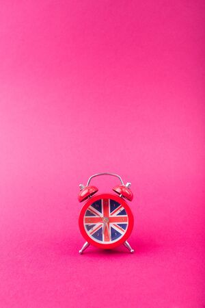 English clock with the colors of the British flag. Time to learn English.-Image