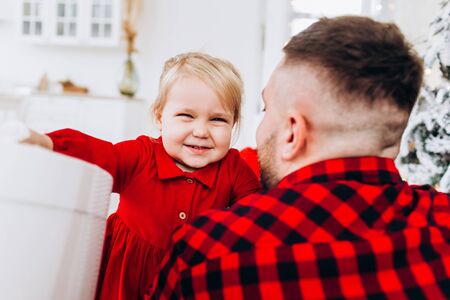 Father and daughter. The best father. Dad gives his daughter a present.