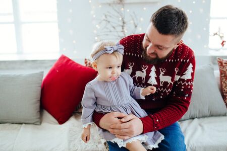 Dad hugs daughter. The best dad in the world. Father is playing with a child.の写真素材