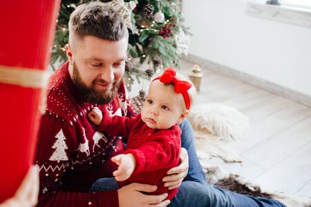 Dad hugs daughter. The best dad in the world. Father is playing with a child.