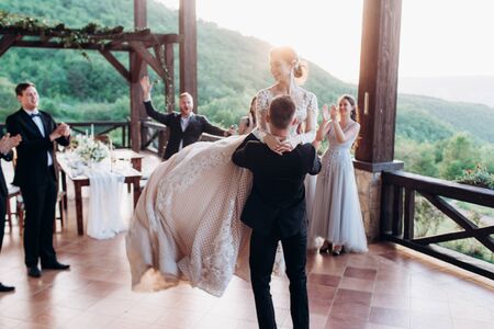 The first dance of the young. The bride and groom are dancing their first dance.