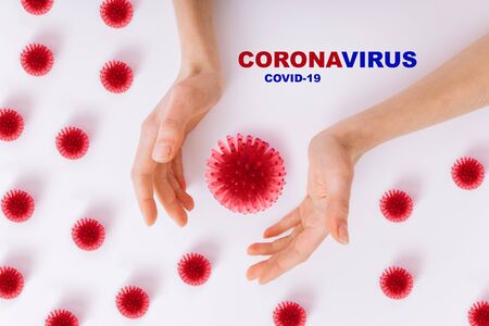 The concept of coronavirus quarantine. New Coronavirus (COVID-19). Hands reach for coronovirus. Clean hands fights coronavirus (COVID-19). Pandemic 2019-2020.の写真素材