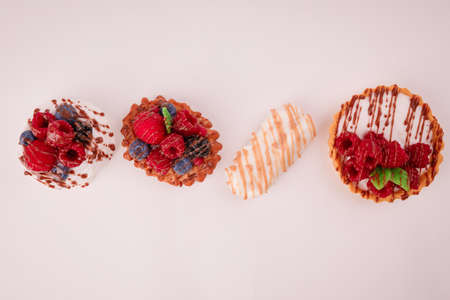 Fresh cake with raspberries in powdered sugar. Dessert in a cafe for breakfast.の写真素材