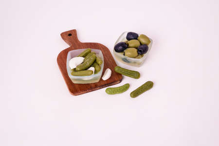Pickles cucumbers with garlic on a white plate. Russian menu.の写真素材