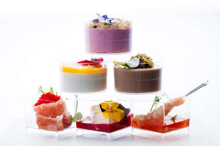 Sweet snacks in clear glasses for events. Catering.の写真素材