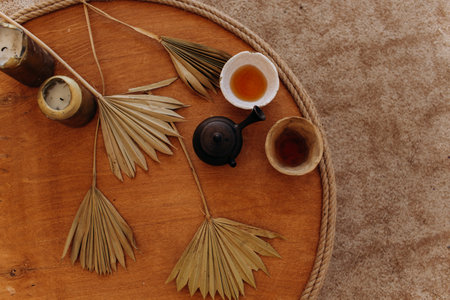 Tea ceremony at a boho wedding. Bride and groom in boho.の写真素材