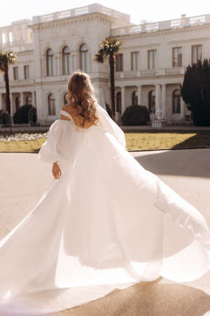 Long flowing wedding dress of the bride.の写真素材