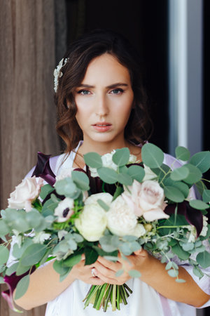 Bride with a wedding bouquet. Morning with Bride.の写真素材