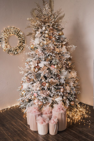 New Year tree with silver balls and bows. New Years and Christmas.の写真素材