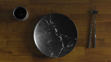 Traditional empty Ceramic Dish on Wooden Tableの写真素材