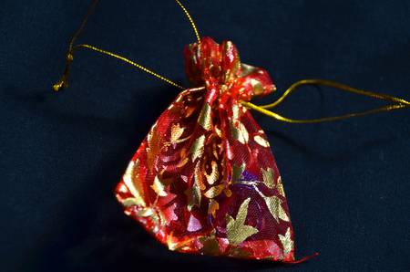 A sack with a small ring in itの写真素材